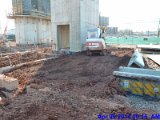 Compacting soil around foundation walls at Elev. 5-6 Facing (800x600).jpg
